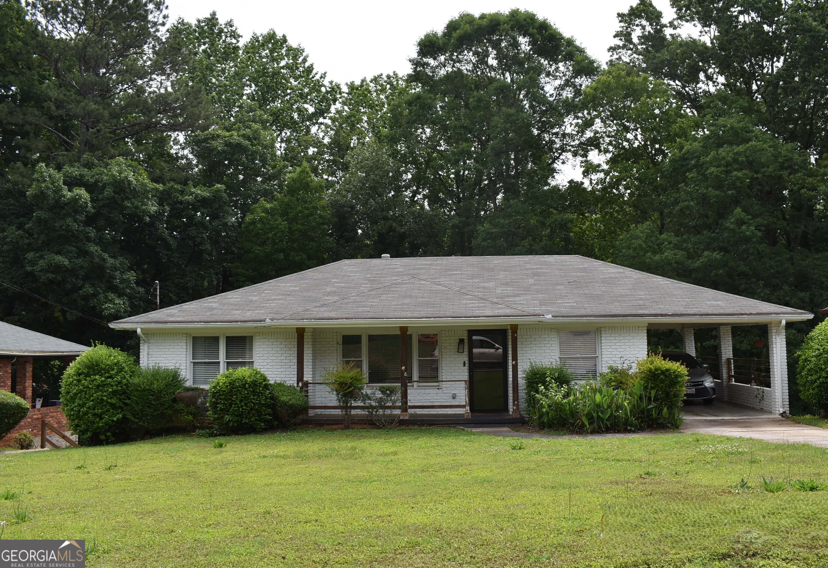 Fully renovated 4-sided brick ranch with finished basement in Venetian Hills. The main level offers an open layout combining kitchen, dining, and living areas. Common areas feature durable flooring, with carpet limited to bedrooms. The kitchen includes new shaker-style gray cabinets with soft-close hinges, quartz countertops, and a full stainless steel appliance package, including refrigerator. Bathrooms have been fully updated. The basement includes a separate family room, bedroom, full bath, and a flex space suitable for an office, playroom, or additional bedroom. Renovation updates include a new HVAC system (furnace and compressor), new electrical panel and wiring, updated plumbing and fixtures, waterproofed basement, new windows throughout, smart front door with fingerprint lock, recessed lighting in living room, kitchen, master bedroom, and basement, plus new ceiling fans and fixtures. No HOA. Convenient location near the BeltLine, MARTA, Lee & White, Tyler Perry Studios, Mercedes-Benz Stadium, State Farm Arena, Atlanta Airport, I-20, I-85, Buckhead, and Midtown.