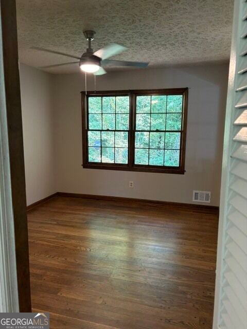 Photo of 482 Dogwood Drive NW, Lilburn, GA 30047 (MLS # 10869383)