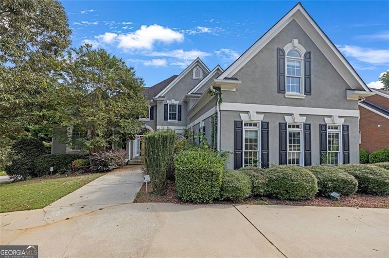 Welcome home to 2780 Wellington Way, a spacious Conyers residence offering comfort, functionality, and flexibility. The main level features inviting living and dining spaces with abundant natural light, a well-appointed kitchen, and a cozy family room perfect for entertaining and a kitchen level 3 car garage. Upstairs, enjoy a private primary suite with walk-in closet and bath, plus generously sized secondary bedrooms. The finished basement is a true highlight-complete with a full second kitchen, living area, and additional space ideal for guests, extended family, or multi-generational living. Outdoors, a level backyard and patio set the stage for relaxing weekends, gardening, or play. Conveniently located near shopping, dining, parks, and with quick access to I-20 for commuting, this move-in ready home combines everyday ease with exceptional versatility.