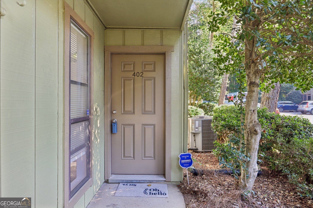 Photo of 402 Dunbar Drive, Dunwoody, GA 30338 (MLS # 10869797)