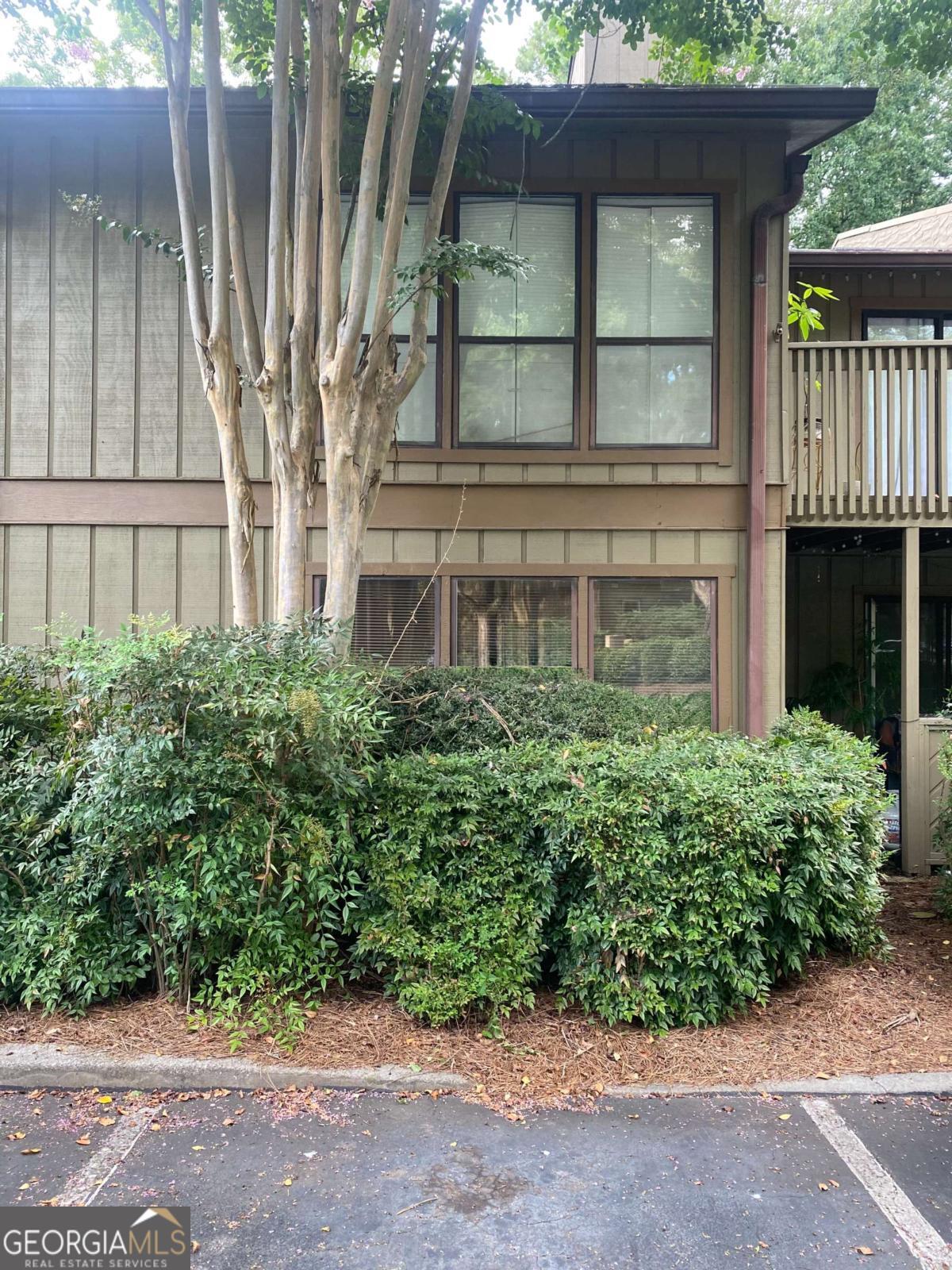 Serene Condo Living in the Heart of Dunwoody! Discover a hidden gem in a quiet residential enclave just minutes from Brook Run Park, downtown Dunwoody, Chamblee's trendy dining scene, and Perimeter Mall. This 1-bedroom + den, 1-bathroom condo offers a perfect blend of sophistication and serenity, ideal for both homeowners and savvy investors-with no rental restrictions. Enjoy seamless indoor-outdoor living with dual access to a spacious, covered balcony-ideal for morning coffee or unwinding in the fresh air. The spacious bedroom offers both comfort and function with a walk-in closet and direct balcony access, making it a peaceful retreat. The community enhances your lifestyle with amenities like a swimming pool and electric vehicle charging stations, all set in a beautifully landscaped environment. Where convenience meets calm, this condo offers easy access to I-285, GA-400, and nearby hotspots-while still feeling worlds away from the hustle. Rarely does a home offer this much style, space, and serenity in such a prime location. Welcome to your happy place-ready to move in or rent out!