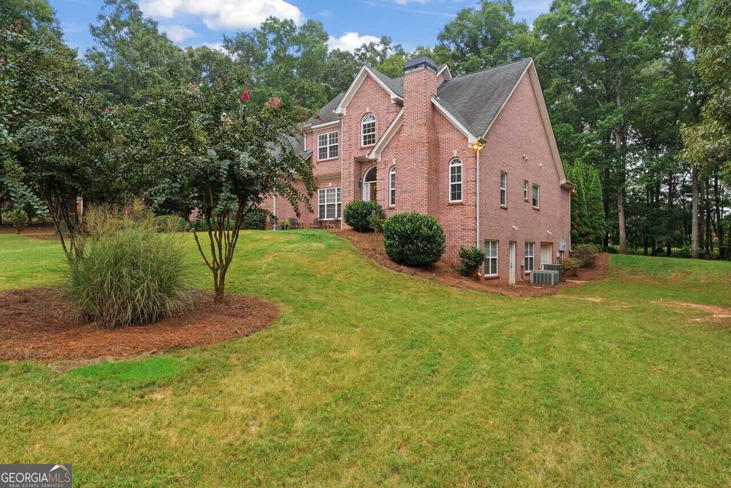 Photo of 1114 Charleston Ridge RDG, McDonough, GA 30252 (MLS # 10866930)