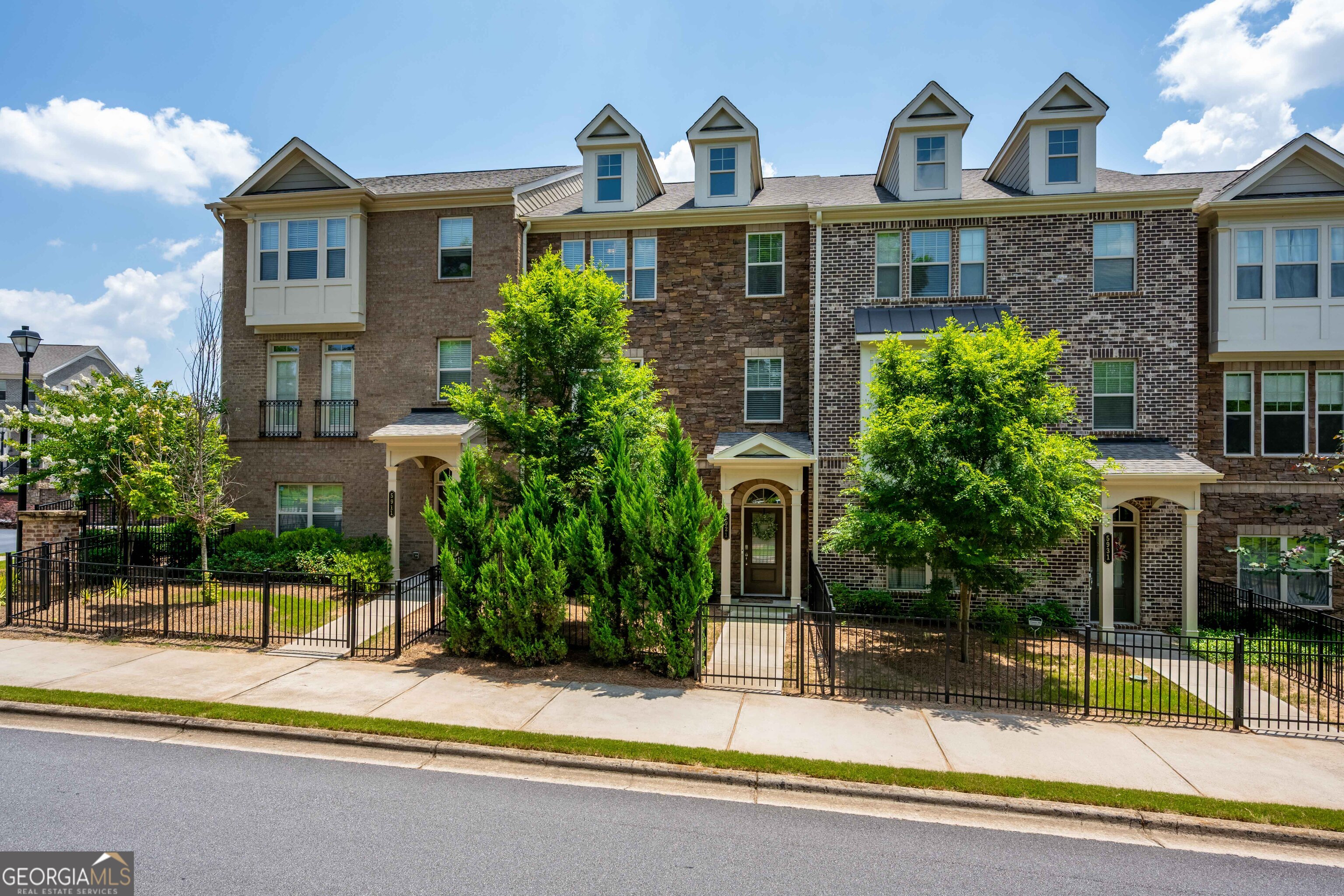 Live in Luxury in Peachtree Corners! Brand New Townhome with community Pool! This stunning 4-bedroom, 3.5-bathroom townhome in Peachtree Corners is exactly what you've been searching for! Built in 2020, this gorgeous property boasts modern finishes throughout, featuring designer fixtures and white cabinets for a touch of elegance. Enjoy the peace of mind and convenience of a gated community with a sparkling swimming pool, perfect for relaxing on those hot summer days. And trash removal is included in your rent, so that's one less thing to worry about! Here's what makes this home truly special: 4 spacious bedrooms, 3.5 bathrooms, just like brand new construction with designer fixtures and white cabinets throughout, secure gated community, sparkling swimming pool access, trash removal included in rent. Convenient 2-car garage, walking distance to top-rated schools. Please note that pets are not allowed in this property. Don't miss out on this incredible opportunity to live in a luxurious townhome in a fantastic location! Schedule a showing today!