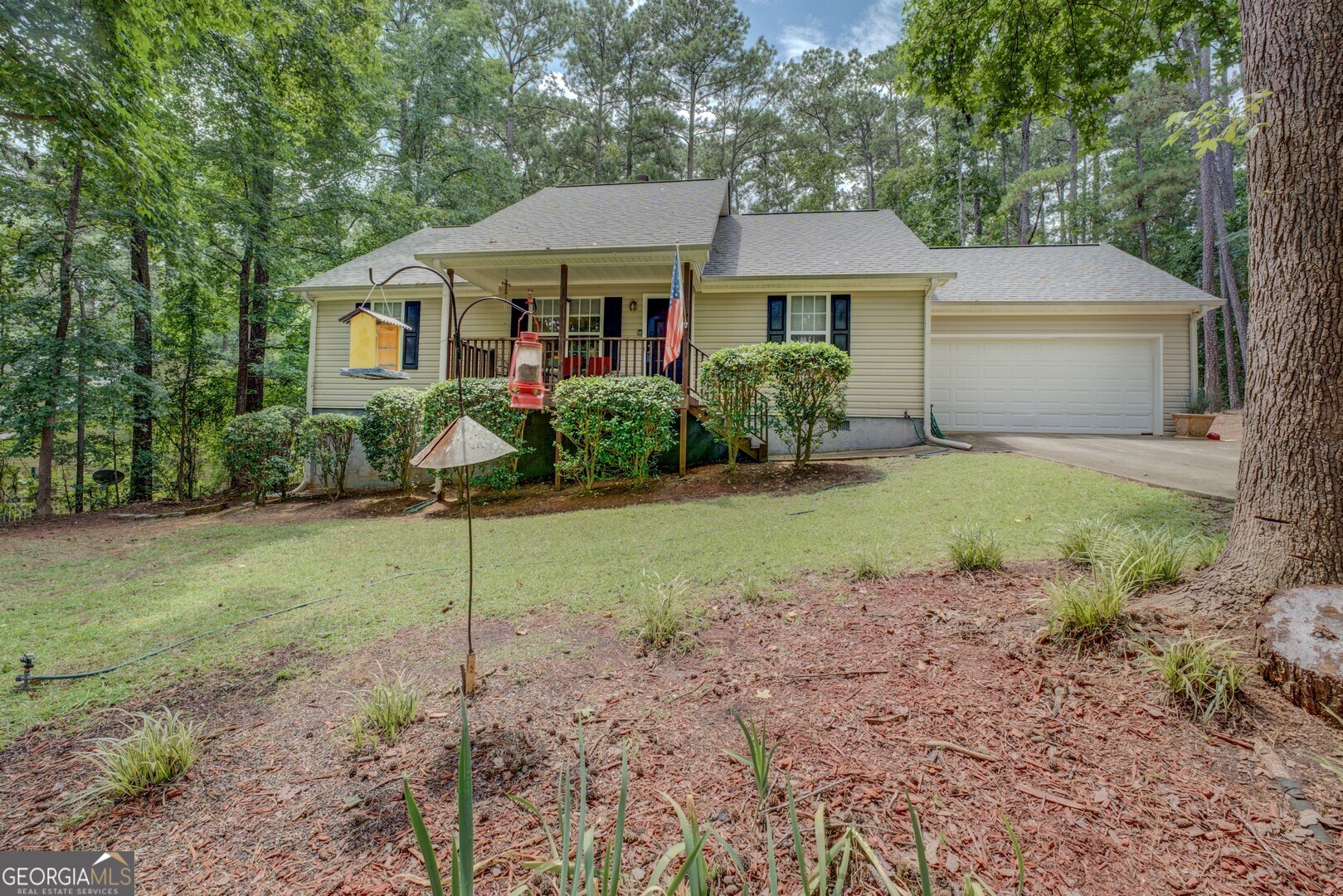 Clean well-maintained move-in ready 3/2 ranch home with a large 2-car garage located in Turtle Cove! Just minutes from Jackson Lake access this attractive home that features a new roof, new HVAC, new water filtration system, security system, updated stand-up crawl space with plenty of storage, LVP flooring through-out the main areas of the home, large kitchen area with all kitchen appliances staying, large laundry room with the washer and dryer staying, split floor plan with large primary bedroom that includes a walk-in closet & primary bathroom suite and dining area overlooking your private deck & fenced in backyard! Turtle Cove features 5 white sand beaches some with boat ramps, newly renovated clubhouse with restaurant & full bar, well-maintained 9-hole golf course, pickleball/tennis courts and oversized partially covered private pool with plenty of patio area for hanging out! Across the street is Turtle Cove green space and will never be built on. This home also sits back off the road so you can enjoy privacy, peace and quiet!! Turtle Cove is an amazing community that features a golf course, newly remodeled clubhouse with full restaurant & bar, large partially covered pool, tennis, pickleball courts & white sand beaches with 3 boat ramps.