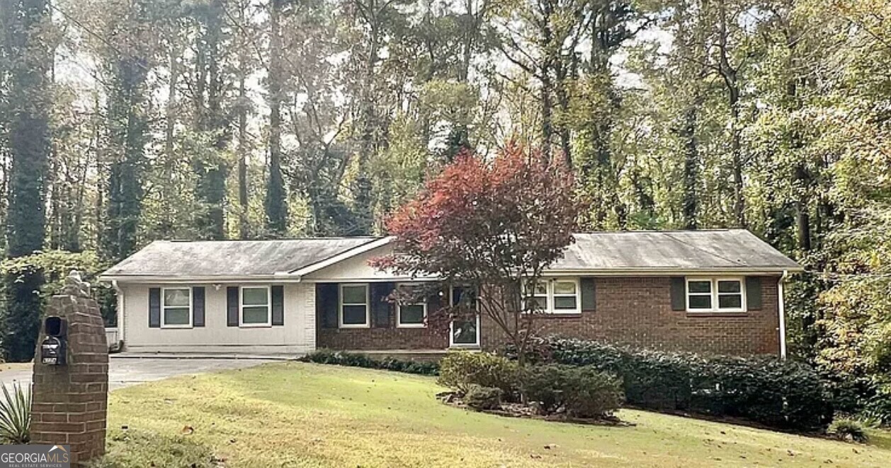 This charming home features three bedrooms and three full bathrooms, with a bonus room that can serve as a fourth bedroom, home office, or den. The home sits on a partial unfinished basement, offering plenty of potential for additional living space or storage. Enjoy outdoor living with two large decks, perfect for relaxing or entertaining. Nestled on a peaceful cul-de-sac, this four-sided brick home offers comfort, versatility and timeless curb appeal.