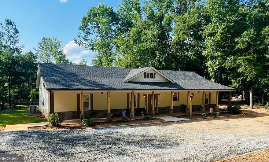 Coming Soon! A private paradise! Recently built 4-bedroom & 2-bathroom custom home set on 5.4+/- acres with a private pond and just minutes from Jackson Lake! Built in 2023 the roof, HVAC, water heater, appliances all less than 2 years old! This stepless ranch home features an open floor plan, LVP flooring, new carpet in the bedrooms, custom kitchen cabinets, countertops and fixtures, custom lighting, custom wood burning fireplace, large primary suite with oversized walk-in closet & spa like bathroom with double vanities, walk-in shower & soaking tub. Outside is where the fun starts with plenty of room for outdoor activities on your own private land! Some of the main outdoor features include plenty of parking, a rocking chair front porch, back deck overlooking the pond, fenced in gated property, one bedroom guest cottage, workshop, awning building, hen house and shed all stay with the property! This property also includes an underground tornado shelter. Set back off the road this level grade property is very private and peaceful!