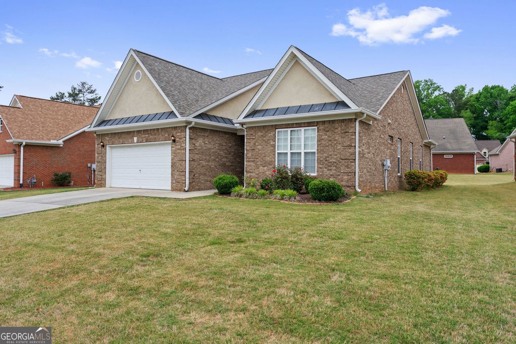 Photo of 8515 Spivey Village Way, Jonesboro, GA 30236 (MLS # 10753627)