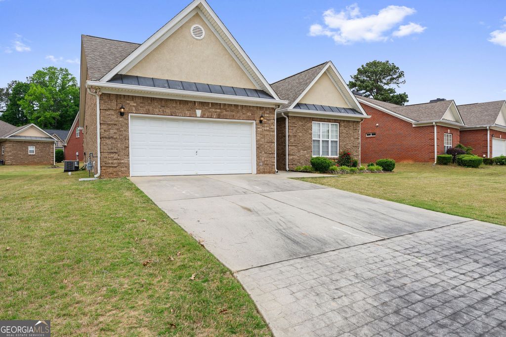 Photo of 8515 Spivey Village Way, Jonesboro, GA 30236 (MLS # 10753627)
