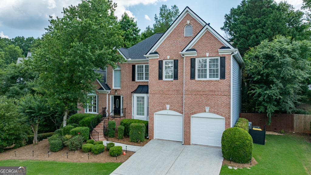 Photo of 7055 Devonhall Way, Johns Creek, GA 30097 (MLS # 10785344)