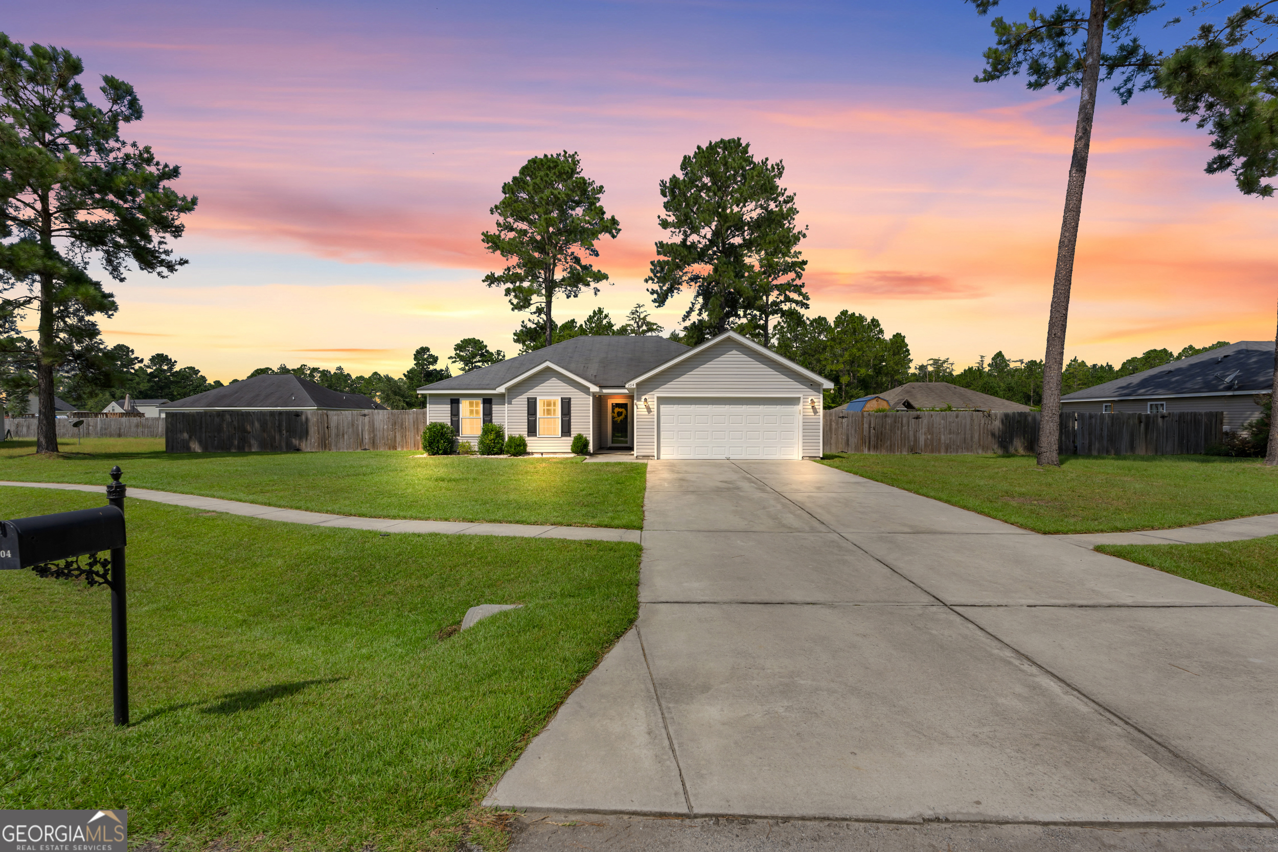 Discover this charming 3-bedroom, 2-bath home in Shadowbrook, where comfort meets convenience and everyday living feels effortless. Designed with an inviting open-concept layout, the spacious living room flows into a bright kitchen featuring a farmhouse sink and oversized island that's perfect for cooking, gathering, and entertaining. Step outside to your own private retreat with a covered back patio and large fenced backyard-ideal for pets, kids, or weekend barbecues. With a split-bedroom plan for privacy, no HOA restrictions, and exclusive community boat ramp access to the scenic Ebenezer Creek, this home offers both lifestyle and value, making it a standout choice for anyone seeking a beautiful starter home with room to grow. **Seller offering $5,000 incentive toward buyer's closing costs with an acceptable contract**