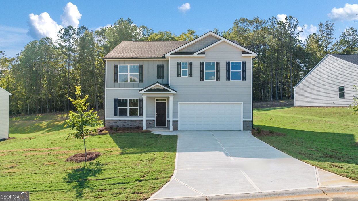 Live the Lake Life at Lake Oconee! Easy access to I-20, Gated Community with a pool, cabana, tot lot, and highly sought-after Morgan County Charter School System. A little over an hour east of Atlanta. Located just minutes from 3 marinas, Lake Oconee shopping, restaurants and many water sports. And for those looking to shop and dine locally, there is nearby Farmview Market, Oconee Village and Harmony Crossing. UP TO $10,000 IN SELLER PAID CLOSING COST WITH PREFERED LENDER. The HAYDEN floorplan at Kingston Ranch at Lake Oconee is a two-story home offering 2,511 sq. ft. of living space across 5 bedrooms and 3 full bathrooms. The 2-car garage ensures plenty of space for vehicles and storage. Your style, your way. This expansive plan is one of our most popular, offering a flex space that could be tailored to become a dedicated home office or formal dining room. A guest bedroom with full bath on the main provides the ultimate retreat for visiting family and guests. There is also a central family room that opens to the kitchen, a space that boasts an extended island with bar stool seating, granite countertops and stainless-steel appliances. Upstairs features a generous bedroom suite with spa-like bath featuring dual vanities, shower and separate garden tub plus lots if closet space. There is also a versatile loft perfect as a secondary family room for movie nights and game day. Photos used for illustrative purposes and may not depict actual home.