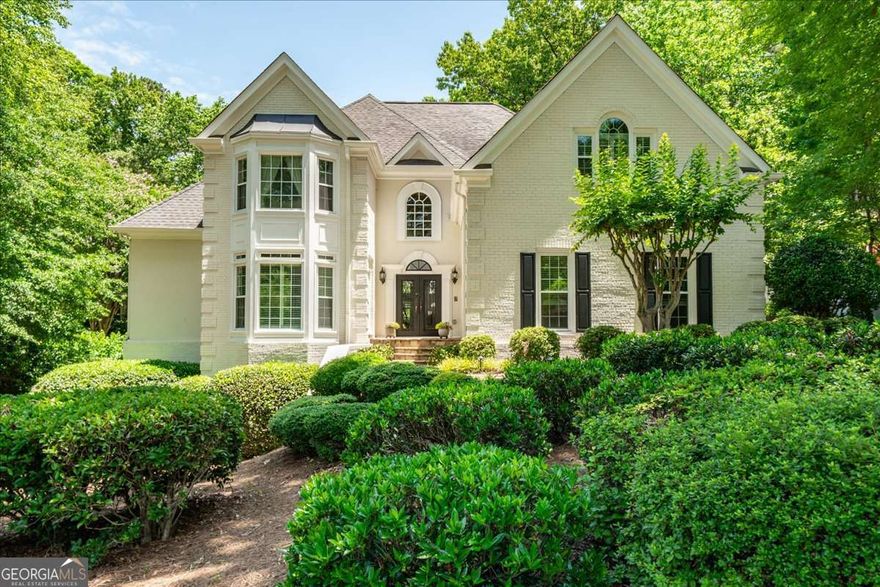 Welcome to effortless luxury in one of East Cobb's most desirable enclaves. This meticulously maintained Oyster White brick home offers timeless elegance, modern convenience, and the kind of thoughtful upgrades that discerning buyers truly appreciate. From the moment you step through the custom iron double entry doors, you'll feel the quality and care that has gone into every inch of this residence.    Enjoy main-level living with a spacious owner's suite that features a renovated bathroom, complete with travertine floors, marble counters, and custom cabinetry. The open and airy layout flows seamlessly from the elegant curved staircase in the foyer to a soaring great room, private office, and gracious dining room-perfect for hosting intimate dinners or holiday gatherings.    At the heart of the home is a showstopping chef's kitchen, outfitted with top-tier custom cabinetry, a GE Monogram built-in refrigerator, Dacor double ovens, a 6-burner gas cooktop, warming drawer, granite counters, and an oversized island ideal for casual entertaining. Just off the kitchen, a peaceful slate-floored screen porch invites you to savor your morning coffee or evening wine.    Upstairs, you'll find beautifully updated bedrooms and bathrooms (one bedroom is the size of a master suite!) with designer finishes and custom storage solutions. The terrace level offers the perfect blend of function and fun, featuring a full bar with SubZero fridge/freezer, wine cellar, billiards/game room, gas fireplace with stone surround, 3 flexible rooms for guests or 2 home offices and a private covered and weather-protected patio.    Additional highlights include upgraded triple-pane windows, a recently replaced roof, newer HVAC systems (3 total), a replaced driveway, and even a garage with a gleaming granite-finish floor. Don't miss the walk-in storage upstairs!  All of this nestled on a culdesac street in beautiful Sentinel Lake which is a short drive to shopping and I-75.  There are truly too many upgrades and benefits to list-you simply must see it in person!    Ready for a home that lives as beautifully as it looks? Schedule your private showing today and discover why this East Cobb gem is the perfect fit for your next season of life.