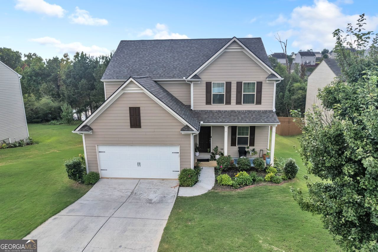 This 4-bedroom, 2.5-bath home offers a bright, open-concept design that's perfect for everyday living and entertaining. The main level features a spacious living area, dining space, and a kitchen equipped with stainless steel appliances, granite countertops, and custom cabinetry. Upstairs, the private owner's suite includes a large soaking tub, walk-in closet, and a beautifully designed bathroom. Three additional bedrooms provide flexibility for guests, a home office, or creative space. Take advantage of resort-style amenities just steps away-pool, clubhouse, playground, pavilion, and BBQ areas-while enjoying the convenience of being close to Publix, Walmart, Aldi, and less than 25 miles from Athens. This home blends comfort, upgrades, and community living in an unbeatable location. Don't miss your chance to make this your next move!