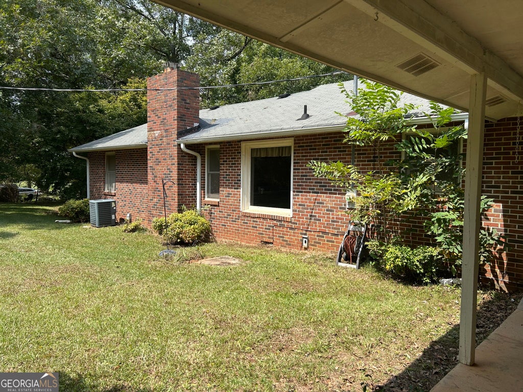 Photo of 115 Price Drive W, Locust Grove, GA 30248 (MLS # 10841439)