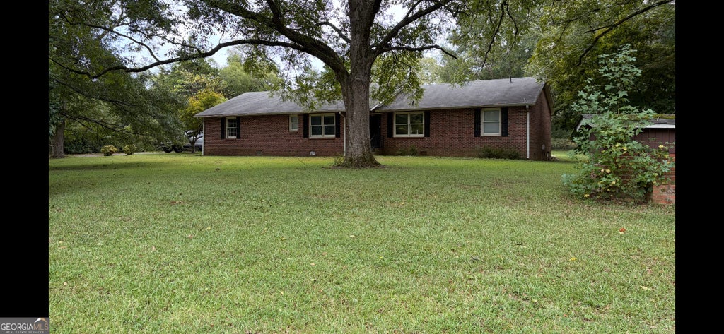 Photo of 115 Price Drive W, Locust Grove, GA 30248 (MLS # 10841439)