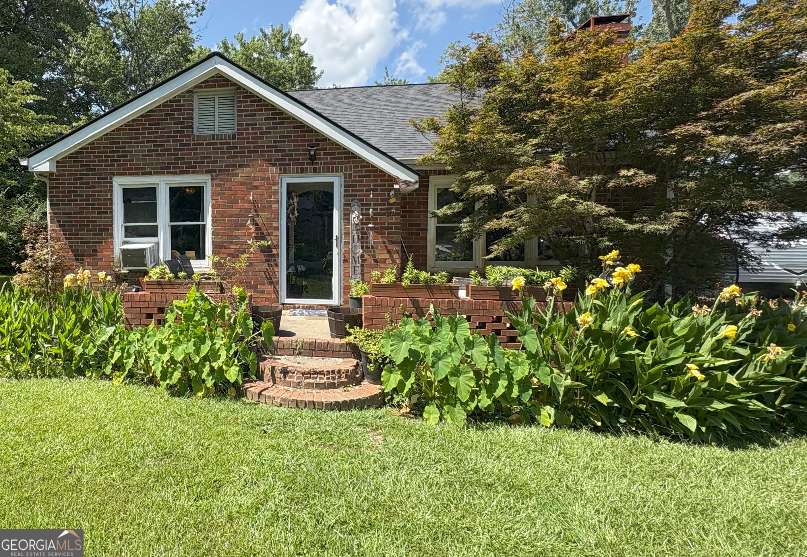This solidly built 3-bedroom, 2-bath home offers timeless appeal with its classic 4-sided brick exterior and welcoming layout. Nestled on a level lot, the property features a cozy living space anchored by a brick fireplace-perfect for relaxing evenings. With spacious bedrooms, two full bathrooms, and great bones throughout, this home is a rare opportunity for buyers seeking value and potential. Located close to shopping, parks, schools and I-20.Whether you're an investor or a savvy homeowner, this is a great AS-IS home.
