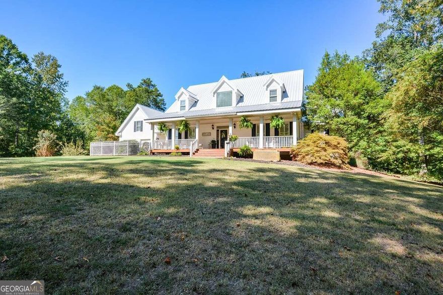 Get into Paulding county just in time to be at the front of more growth and development. A total of 200+ acres and endless opportunities. This estate is currently boasting a stunning and well maintained gated single family home w/ 2+ car garage, finished loft area and nearby barn nestled amongst a gorgeously scenic and peaceful lake, pasture with cattle, goats, a previously functioning chicken coop, and multiple variations of fruit and nut trees that backs up to a portion of Sweetwater Creek and the premier Paulding County recreational and green space The Taylor Farm Park. It only gets sweeter with the inclusion of the Palmer Cap-Chur Equipment industrial building boasting a gated 7,500 +/- square feet warehouse with dedicated office spaces, storage rooms, reception area, bathrooms, break room, concrete vaults, loading docks, and 20+ parking spaces. The warehouse has additional rear storage and has been plumbed for more restrooms locking in the option for this single building to easily be divided into two separate buildings surrounded by more land that is not yet developed and waiting for your vision.  This land takes you all the way to Hwy 92/ Dallas Hwy with a direct route by way of 78 to I-20 putting Atlanta Hartsfield Airport and all that the city/ metro Atlanta has to offer in close proximity. NOTE: This Residential listing price includes two other MLS Listings, the afore mentioned land tract and industrial warehouse under address 421 Tidwell Rd & 0000 Dallas Highway/ Hwy 94 & Tidwell Rd. APPOINTMENT ONLY PLEASE DO NOT VISIT THE BUSINESS/ WAREHOUSE WITH OUT AN APPOINTMENT.