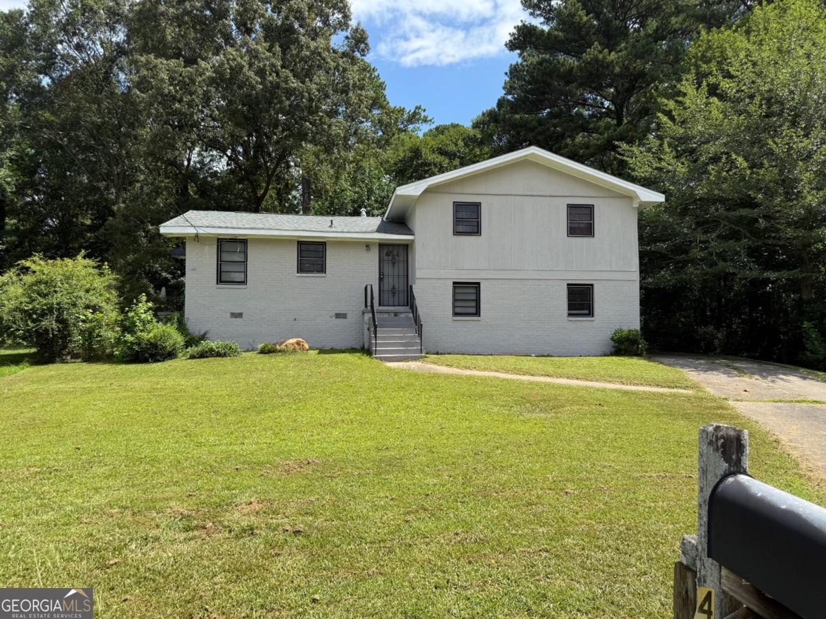 Priced to Sell! This 3-bedroom, 2-bath split level brick home is bursting with potential and ready for the right buyer to bring it to life. Whether you're searching for your next renovation project or a budget-friendly canvas to create your dream home, this is the one. While it needs some TLC, the possibilities are endless-transform it into a charming personal residence or a profitable investment property. Located in a desirable area, this opportunity won't last long. Showings permitted during due diligence only. Don't miss out-submit your offer today!