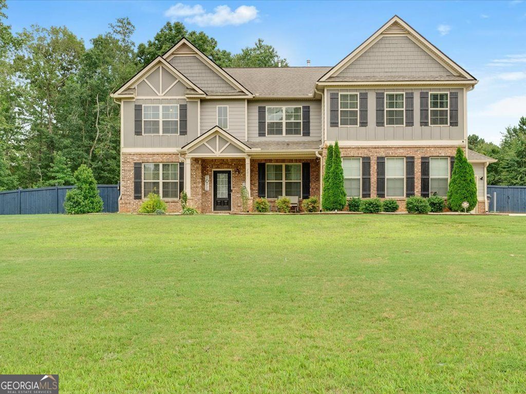 Luxurious Living on 2+ Acres in Luella Grove Step into elegance with this beautifully maintained 5-bedroom, 4-bath home nestled on a spacious 2+ acre lot in Luella Grove. Built in 2018, this Coventry plan by Knight Homes offers timeless design and high-end finishes throughout. From the impressive two-story foyer to the formal living and dining rooms, every space is thoughtfully designed for comfort and entertaining. The open-concept great room features decorative columns and flows seamlessly into a chef's kitchen with an oversized island, stainless steel appliances, double ovens, gas cooktop, built-in microwave, walk-in pantry, tile backsplash, and a built-in desk area. A guest suite on the main level offers privacy for visitors, while upstairs you'll find a generous loft and a stunning owner's retreat complete with a separate sitting room, spa-like bathroom with a soaking tub, oversized tiled shower with dual shower heads, split vanities, and a massive walk-in closet. Additional highlights include a 3-car side entry garage with openers, covered 12x15 patio, hardwood flooring, granite countertops throughout, upgraded tile, and a security system. Enjoy peace, privacy, and modern luxury-move in ready!