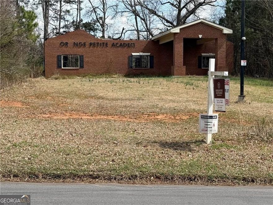 Looking to relocate or expand your business? This 7,200 sq ft property is ready for redevelopment. The existing structure is still standing, however it was damaged by fire - the slab is still usable, and the site is primed for a fresh build. The owner is currently working on applying for an R6 rezoning (from the current R3) - which could potentially allow for a few townhomes to be developed here. Huge upside for an investor or builder to get in now before values rise. Prime location - minutes to Hartsfield-Jackson Airport, South Fulton Parkway, and I-285. Directly across from the South Fulton Tennis Center in one of the fastest growing areas of New South Fulton. Plus - there are plans for a QuikTrip to be built on the corner of Mason Rd, estimated completion Feb 2026, bringing even more traffic and demand to this corridor. Seller is motivated. Weissman is the preferred closing attorney