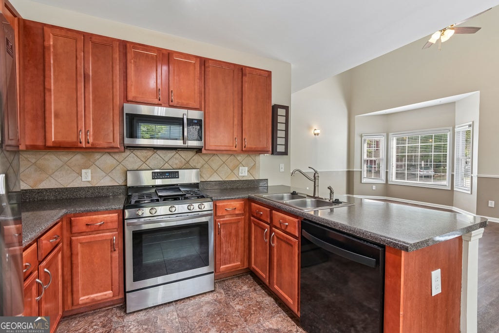 Photo of 203 Valley Crossing, Canton, GA 30114 (MLS # 10821044)
