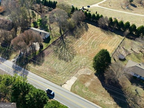 Photo of 10587 E Cherokee Drive, Canton, GA 30115 (MLS # 10672788)