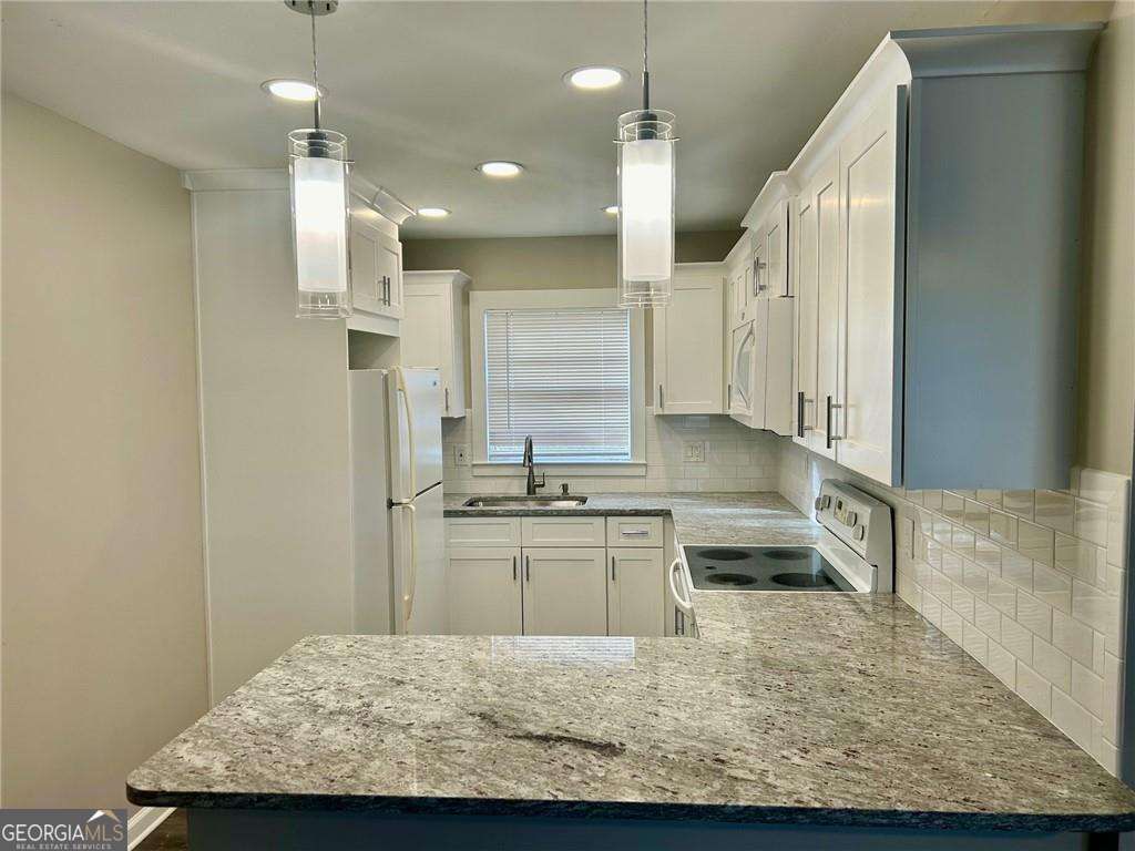 Photo of 2961 Stone Mountain Street, Lithonia, GA 30058 (MLS # 10693903)