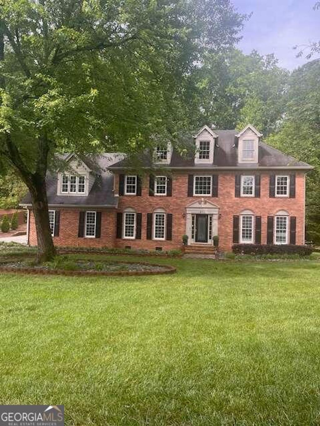 Photo of 871 Cedar Trace SW, Lilburn, GA 30047 (MLS # 10700682)