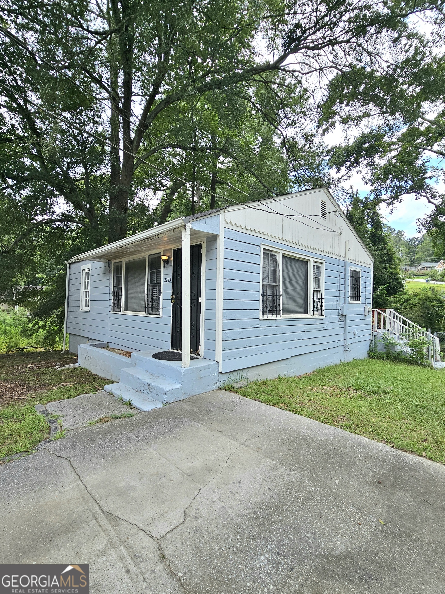 One story home for under $100,000! This is a fixer upper. Great starter on investment opportunity! Best deal in southwest Atlanta! Being sold in as condition only! Cash Offers only! No blind offers! Home is located minutes to Greenbriar Mall, Camp Creek Marketplace, the airport, and major highways.