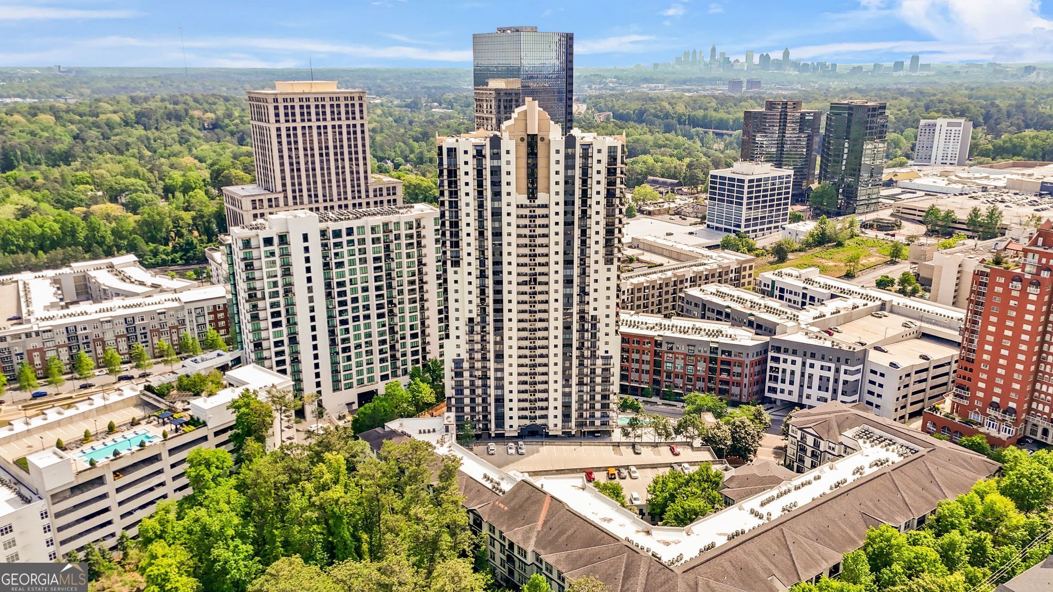 Fully furnished + priced to sell = the perfect Buckhead condo opportunity! Welcome to 3481 Lakeside Drive, a modern, move-in ready 1-bedroom gem in a sought-after FHA-approved high-rise. Whether you're a first-time buyer, downsizing, or looking for a smart investment, this unit delivers on style and convenience. Step into a thoughtfully designed space featuring floor-to-ceiling windows, hardwood floors, and a sleek open-concept layout. The kitchen flows seamlessly into the living area, perfect for entertaining or cozy nights in. The bedroom offers ample space and storage, and the bathroom is beautifully updated. Enjoy hotel-style amenities: 24-hour concierge, pool, gym, and secure parking-all in the heart of Buckhead. Surrounded by top dining, shopping, and easy highway access, you're minutes from everything. Seller is motivated and ready to make a deal-bring your offer!