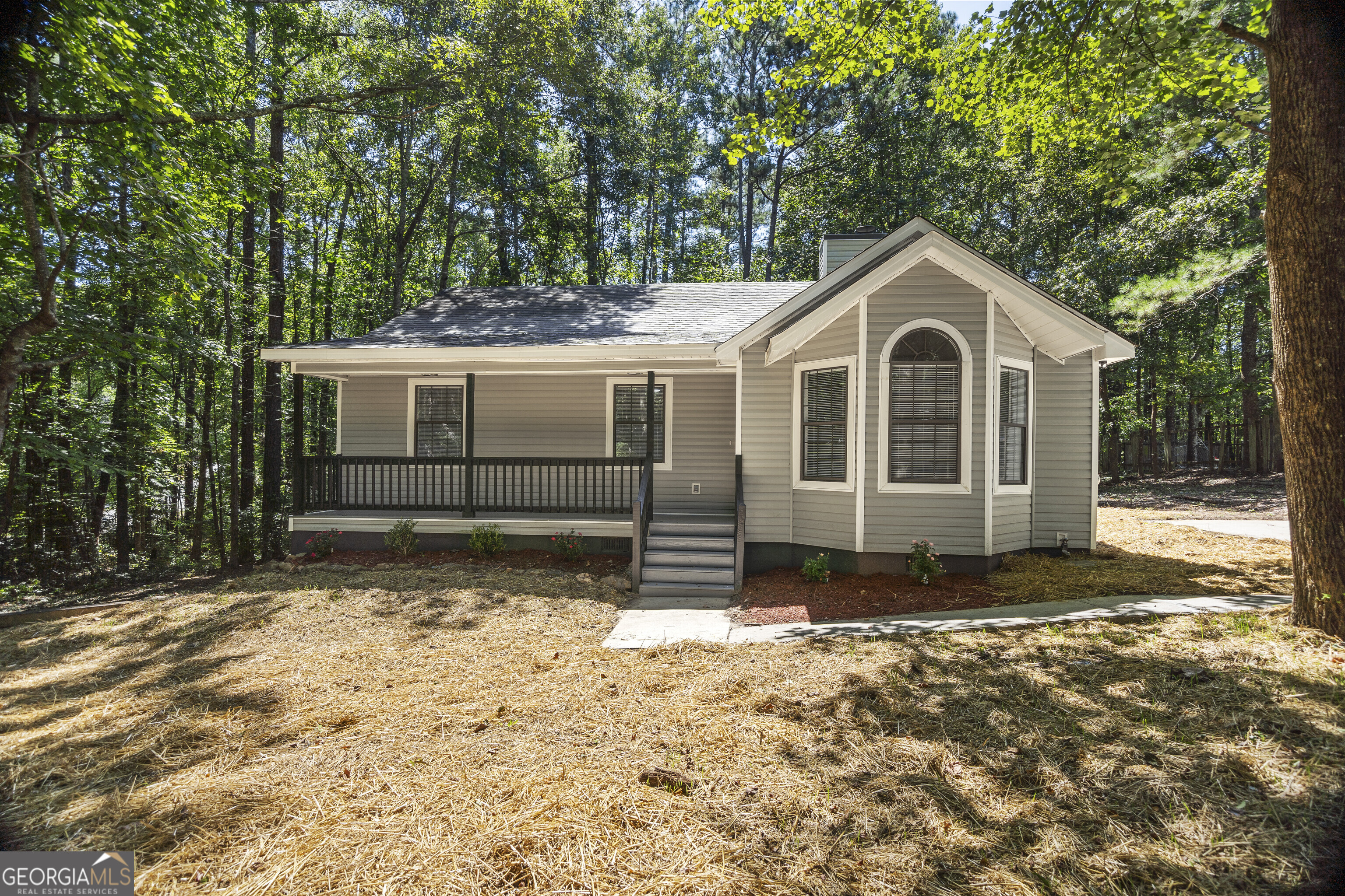OPEN HOUSE THIS SATURDAY 12pm-2pm!! Don't miss your chance to own this beautifully updated 3BR/2BA home in the desirable gated community of Lake Wildwood. From the inviting rocking chair front porch to the relaxing back porch, this home blends charm with modern updates. Step inside to find an all-new kitchen featuring stainless steel appliances, custom tile backsplash, granite countertops, tons of cabinet space, and elegant lighting throughout. The home also boasts stunning LVP flooring, spacious bedrooms, and a huge private yard with a second driveway for added convenience. Living in Lake Wildwood means more than just a home-it's a lifestyle! Residents enjoy a manned gated entrance, an Olympic-sized pool, tennis courts, basketball courts, mini golf, walking trails, picnic areas, a clubhouse, a sandy beach, and of course, lake access. All this with an HOA fee of just $719 per year! This home is truly move-in ready and waiting for you.