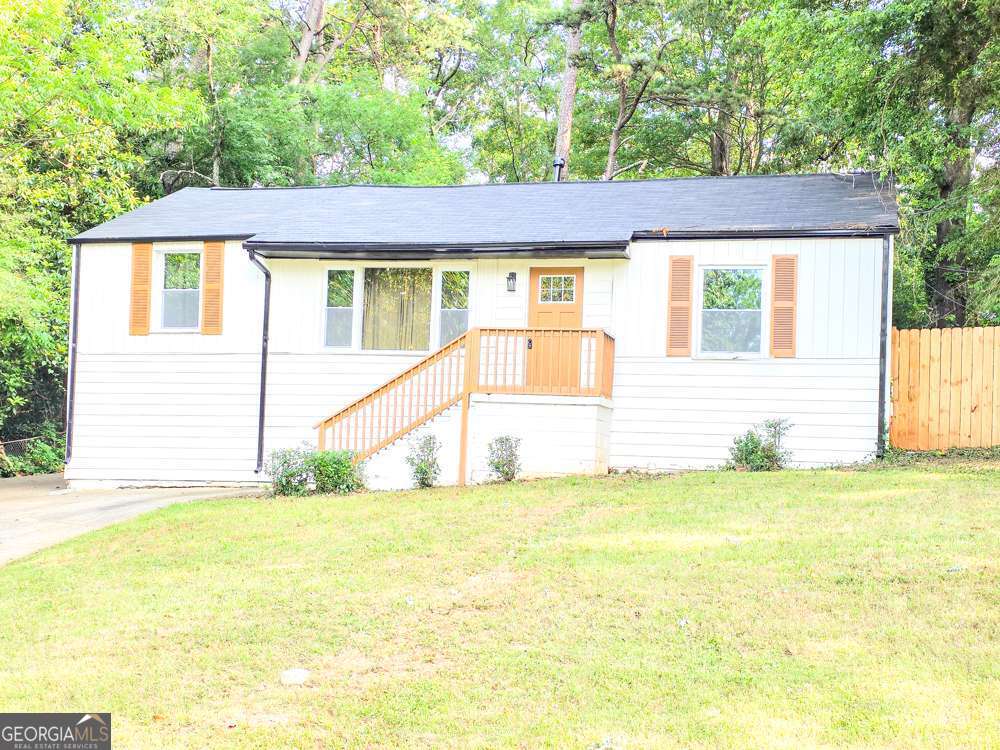 Welcome to this beautifully renovated 3-bedroom, 2-bath ranch-style home in the heart of Smyrna, GA. This move-in-ready gem features an inviting living room and an open kitchen with granite countertops and a stylish tile backsplash, perfect for everyday living and entertaining. Step outside into a spacious, fully fenced backyard, an ideal retreat for weekend BBQs, relaxing evenings, or gatherings with family and friends. The outdoor space is a true highlight, offering both privacy and versatility. Location is everything, and this home delivers. Just minutes from Truist Park and The Battery, you'll enjoy year-round Braves games, concerts, and events. Cumberland Mall and top shopping, dining, and entertainment options are also just 5 minutes away, with quick access to I-285 and I-75 for an easy commute. Currently a flourishing short-term rental, the property can be sold fully furnished, making it a turnkey income-producing investment from day one. Whether you're a first-time buyer or a savvy investor, this home offers comfort, convenience, and opportunity. Seller is motivated to sell so schedule your private tour today before it's gone!