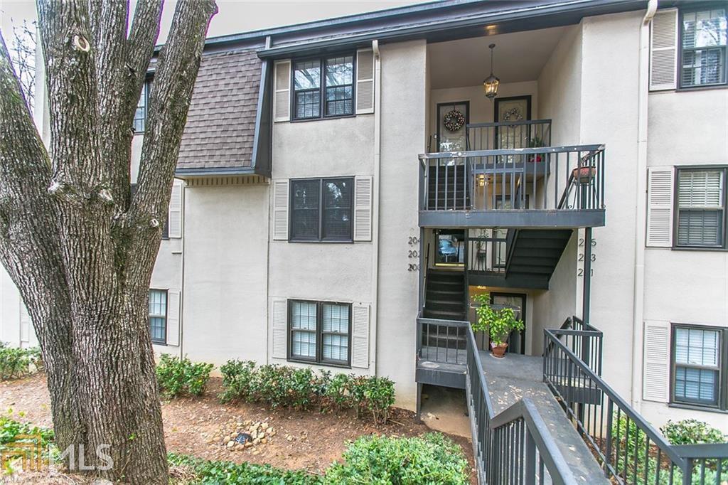 Pristine Top Floor, Bright & light, most desirable & largest floor plan in fabulous gated, 24/7 manned security gate in Buckhead Golf community! Kitchen renovated & wall removed for OPEN Living plan. Formal Dining Room & bonus Sun room. Kitchen w/ Granite white cabinets, NEW SS cook range, dishwasher, microwave 7 fridge incl!Hardwoods through out. Updated baths, HVAC- 7 yrs old. 18 hole, par 3 golf course, pro shop, 3 pools, (2 saltwater), Cafe', Tennis, Fitness center! Top rate schools & convenient to everything yet tucked away for Resort-like tranquility! Washer & Dryer Included!