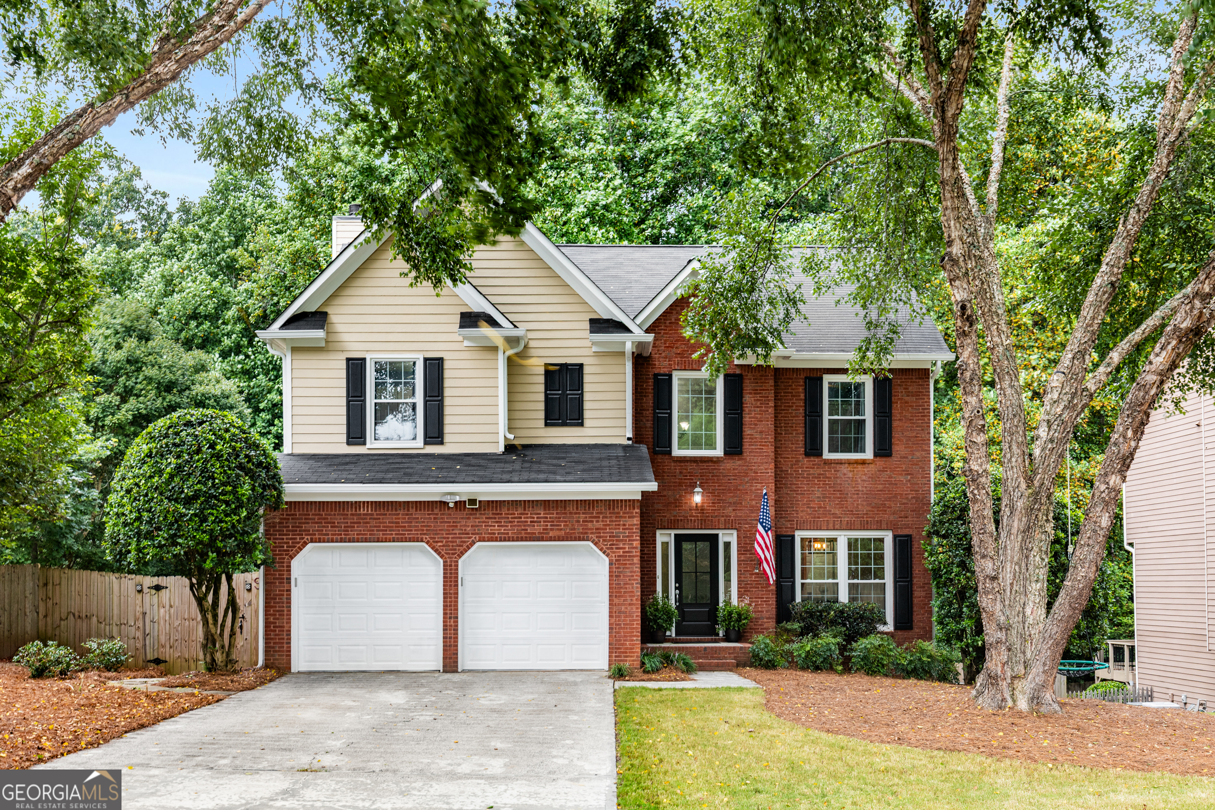 Welcome to 3976 Harmony Walk Way - where charm, comfort, and location come together beautifully! This adorable 4-bedroom, 3.5-bath home is nestled in the super desirable Concord Walk community right in the heart of Smyrna. From the moment you walk in, you'll feel the good vibes-thanks to a bright, open floor plan, cozy fireplace, and a separate dining room that's just waiting to host your next meal. The updated kitchen checks all the boxes with sleek granite countertops, stainless steel appliances, and a perfect view of your private, fenced backyard. Step outside to an amazing deck that's basically begging for summer BBQs, morning coffee, or evening chats under twinkle lights. Upstairs, the spacious primary suite is a total retreat, featuring vaulted ceilings, a spa-inspired bathroom with a soaking tub, double vanities, and a dreamy walk-in closet. Two more bedrooms offer space for kiddos, guests, or a fab home office-and there's a full bath right nearby for convenience. Need extra space? The finished basement has you covered-think movie nights, a home gym, playroom, or that hobby room you've been dreaming about. Toss in a two-car garage, tons of storage, and a location that's just 0.6 miles from the Silver Comet Trail and minutes to The Battery Atlanta, Smyrna Market Village, and major highways-and you've got yourself a total winner. Don't wait-this happy home won't last long! Come see it for yourself and fall in love.