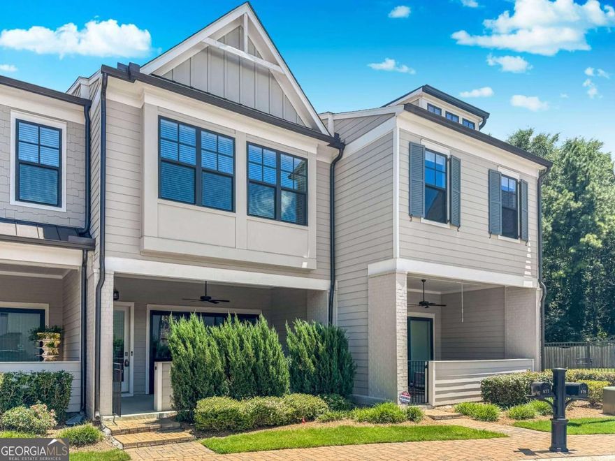 Available Now! Like-New Luxury Townhome in Sought After Village at Towne Lake! Beautiful finishes throughout. Inviting, open-concept floorplan. The large slider doors in the family room open to a great outdoor space with a covered porch for entertaining. Enjoy cooking and relaxing w/ an open chef-inspired kitchen & living area w/ 10+ ft ceilings. This home has modern touches like stone countertops w/ plenty of cabinets and walk-in pantry as well as upgraded lighting . Upstairs you will notice 10ft ceilings and an open rail staircase. The owner's suite showcases a modern light double vanity w/ upgraded countertop, an oversized shower & expansive walk-in closet. Also upstairs, 2 guest BRs with walk-in closets, 2nd full bath with tiled walls and a laundry room. As a bonus the community is gated, beautifully maintained and offers a range of amenities such as: a pool, pickleball court, bocce ball, fire pit, a dog park and more. Resident Benefit Package included. Check out our 5-Star Reviews on Google. Rent quoted reflects discount for on time payment, ask for details.