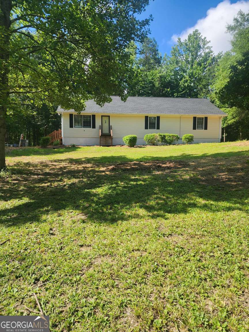 Spacious 3/2 ranch on 5 acres located in Haralson County. This adorable home includes new paint, flooring, stainless steel appliances, granite countertops, new roof and more! USDA eligible!