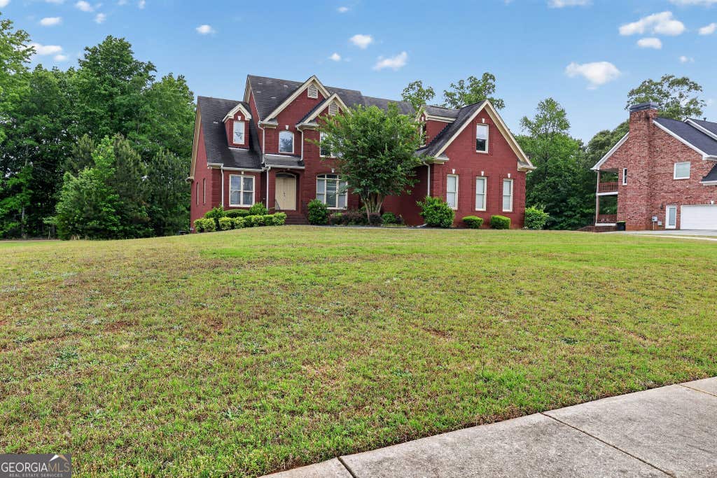 Photo of 148 Chapel Ridge Drive, Ellenwood, GA 30294 (MLS # 10789069)