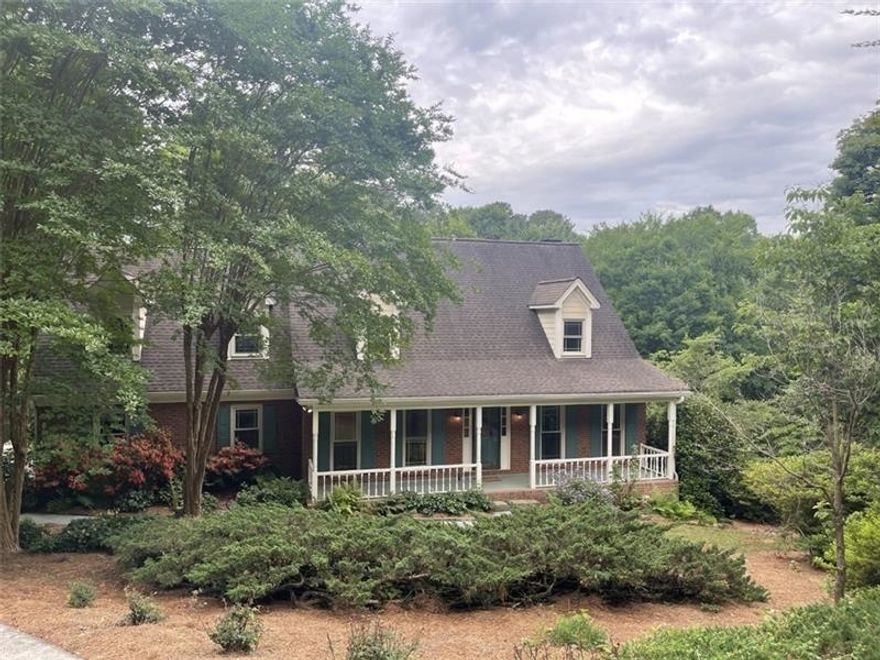 Cape Cod Cul-de-sac Charmer! The yard will "wow" you all year long; something is always blooming! This home features custom appointments like oversized pantry, mudroom/laundry & main bedroom! 'Mrs. Clean' built and lived in this home everyday and it shows. Beautiful white kitchen overlooks the backyard. Panelled fireside family room opens to a formal living room that would be a great home office. Separate dining room off kitchen. Upstairs has the primary en-suite and the 3 additianl bedrooms & bath. The Finished Terrace Level has a finished bathroom, office & play space, a workshop, exterior entry. Swim/tennis is optional and they did just re-surface the tennis courts! Old Town Lilburn is just minutes away with the new ampitheater, restaurants & shops, library & City Hall!