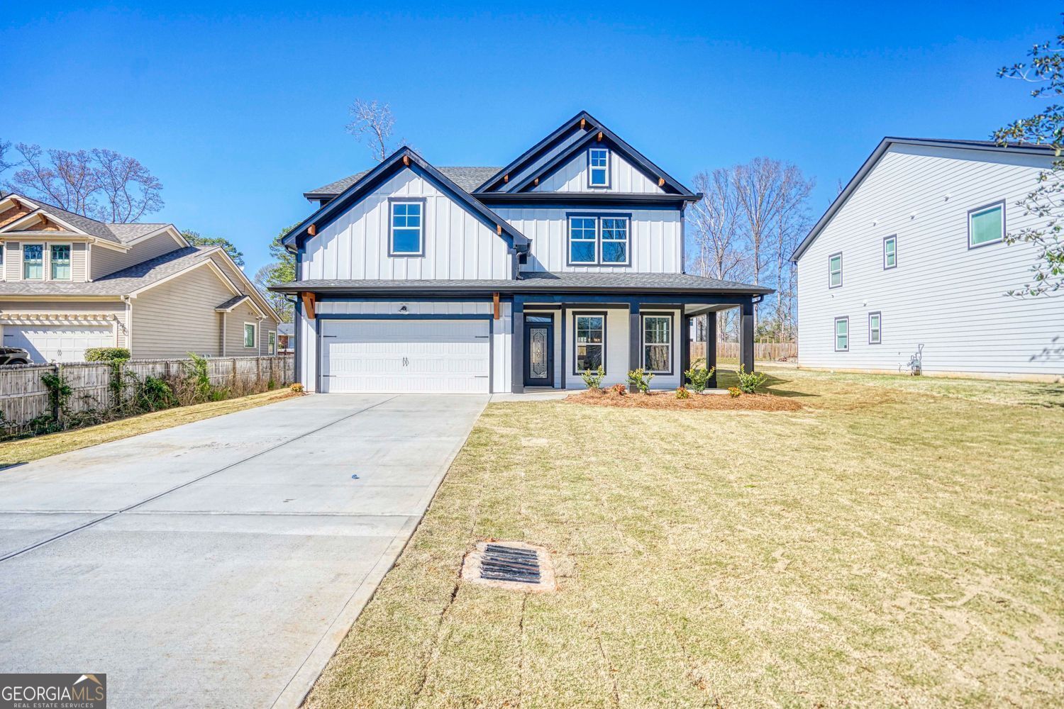 !!OWNER FINANCING AVAILABLE!! CALL FOR DETAILS. **BEAUTIFUL NEW CONSTRUCTION IN OLDE TOWN CONYERS** Come see this well constructed two-story, 4BR / 3.5BA (Two Owner's Suite, One on the main floor with a barn door and one upstairs). Located within walking distance to Olde Town, Parks, Hospital, and minutes from I-20 and HWY 138. The home features an Open Floor Plan with an Island, pendant lighting and Stainless Steel farmhouse sink over looking 2 Story Great Room, Front Wrap Around Porch, Rear covered patio(10'X16'). The beautiful kitchen boast Quartz Counter-Tops along with a waterfall feature for the island, SS Appliances, Back Splash, recessed lighting throughout the home. The property has LVP Waterproof floors through-out, high ceilings and plenty of space with spacious bedrooms for family and friends. Enjoy the large Owner's Suite with tray ceilings, large walk-in closet, soaking tub, and tiled shower. Two Laundry rooms for convenience (One on the main floor and one upstairs).