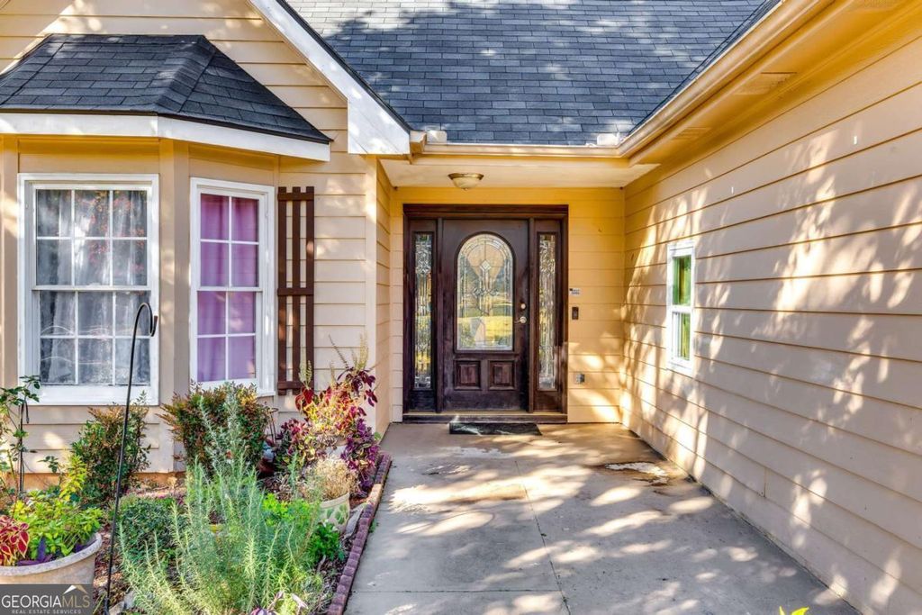 Photo of 1245 Shamrock Hill Circle, Loganville, GA 30052 (MLS # 10706694)