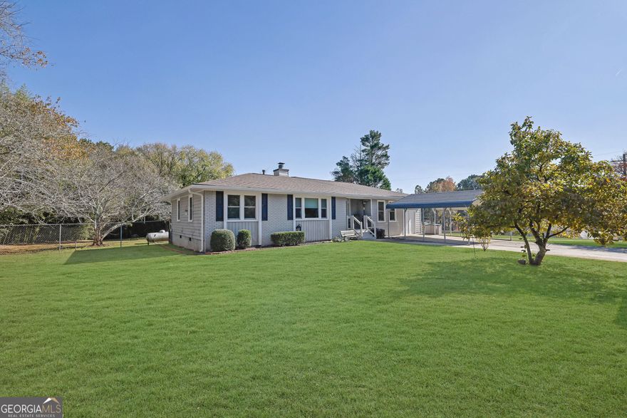 This charming 4-bedroom, 2-bath ranch home sits on a spacious 0.74-acre lot and includes a separate workshop building, perfect for hobbies, storage, or a home business. The private fenced backyard features a firepit and a recently built deck, ideal for outdoor gatherings and relaxation.  Inside, you'll find nicely sized rooms with a comfortable, single-level layout that's both practical and inviting. Recent updates include a new roof and new windows, providing peace of mind and energy efficiency.  Conveniently located near shopping and top-rated Sequoyah High School, this home offers the perfect combination of comfort, privacy, and convenience. Don't miss out on this great opportunity-schedule your showing today!