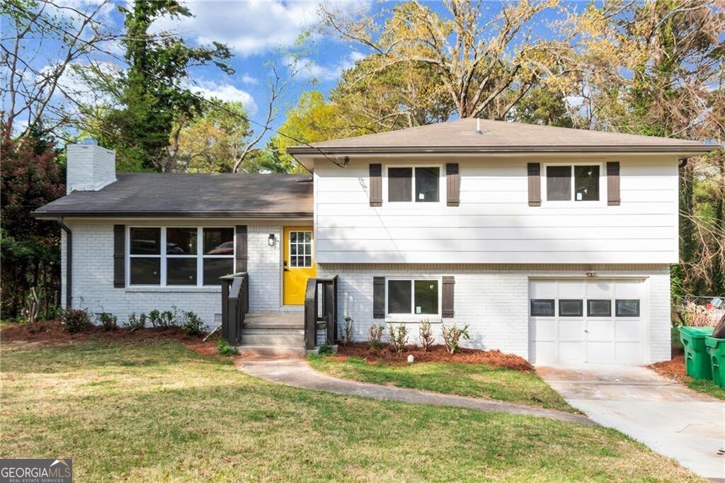 Welcome to this stunning 4-bedroom, 3-bathroom home, beautifully updated from top to bottom and tucked away on nearly half an acre of private, landscaped grounds. Inside, enjoy generous square footage, an open floor plan, and abundant storage throughout. The designer kitchen features all new cabinetry, stainless steel appliances, quartz countertops, and elegant finishes. The upstairs bathrooms have been tastefully modernized, blending function and luxury. A separate bed and bath on the lower level makes the perfect in-law suite or roommate floor plan, complete with privacy and flexibility. Step outside to your huge back deck, ideal for entertaining or relaxing under the trees. The expansive backyard feels like your own private retreat, perfect for children and pets to play. A spacious garage adds even more convenience - for parking, storage, or a workshop. With room to spread out-indoors and out-this home offers a great balance of comfort and style for your family. Set in a quiet, family friendly neighborhood within an established community, this home blends space, function, and modern luxury in a location you'll love.