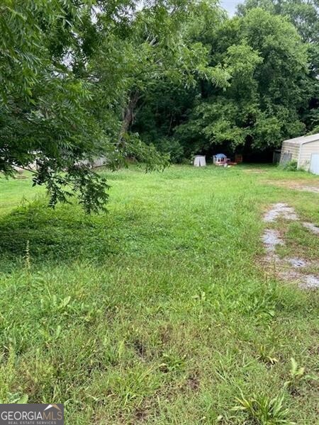 Cleared lot for sale within Rome, GA city limits! This buildable parcel offers excellent proximity to shopping, restaurants, and all city amenities. Perfect for building your dream home in a convenient location.