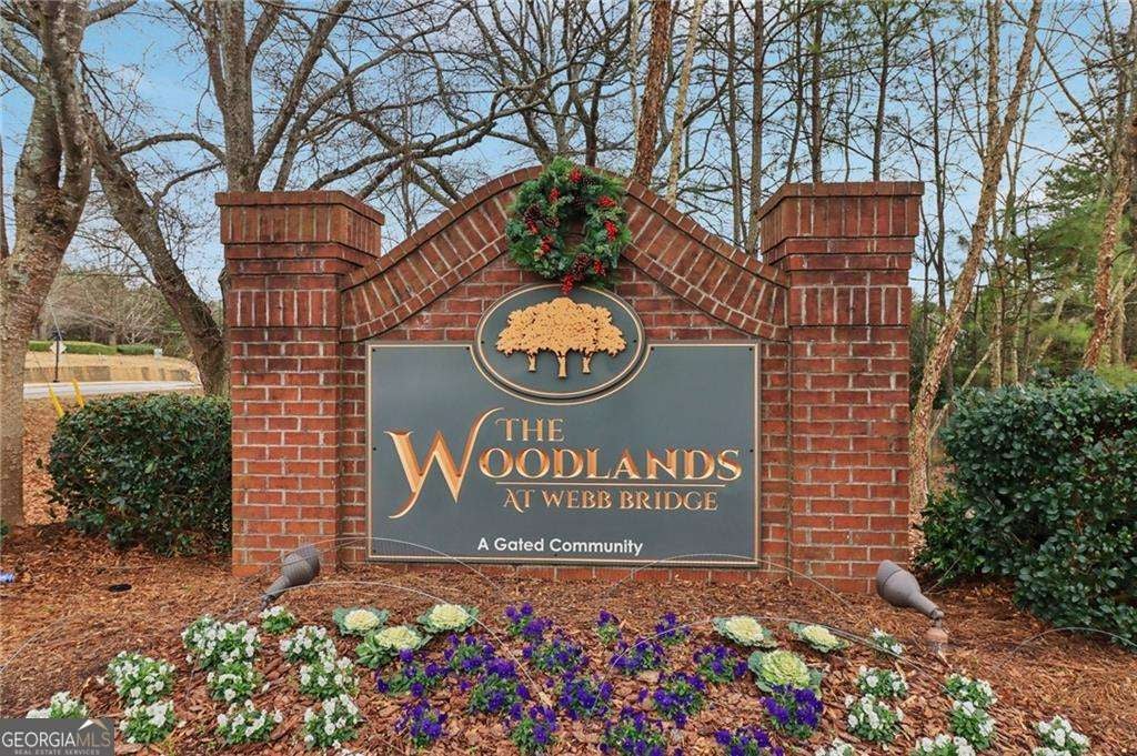 Photo of 4001 Woodland Lane, Alpharetta, GA 30009 (MLS # 10789166)