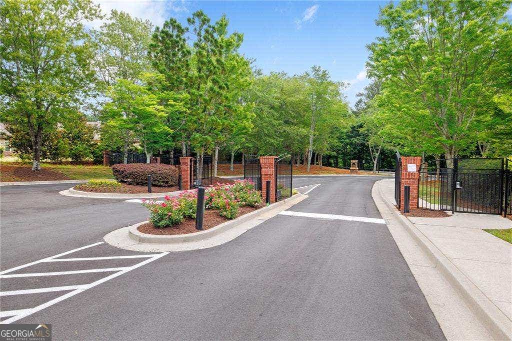 Photo of 4001 Woodland Lane, Alpharetta, GA 30009 (MLS # 10789166)
