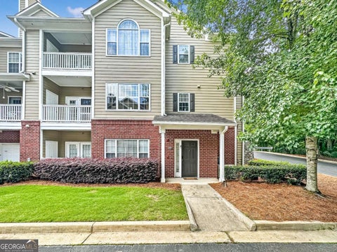 Photo of 4001 Woodland Lane, Alpharetta, GA 30009 (MLS # 10789166)