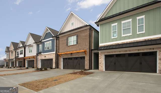 Welcome to the Enclave at Park Haven townhome Community. What a great 3 bedroom 2.5 bath townhome conveniently located near historic downtown Flowery Branch. The kitchen is the heart of the home and features white cabinets, stainless appliances, granite countertops, and a spacious island looking into the great room. Upstairs is a spacious primary bedroom with trey ceilings, a walk-in closet and a beautifully tiled ensuite including both shower, garden tub and double vanity. The laundry room is located upstairs close to the bedrooms. The second and third bedrooms share a Jack & Jill bath. Close to I-985 as well. Enjoy being just minutes away from Flowery Branch's charming downtown - close to restaurants, shopping, and parks. This townhome offers the perfect blend of comfort, convenience, and style! Did we mention that it is minutes from Lake Lanier and I-985? WE NEVER ADVERTISE ON CRAIGSLIST. Please note that pictures were taken 1 year ago and will update them after tenant vacates and before live listing.