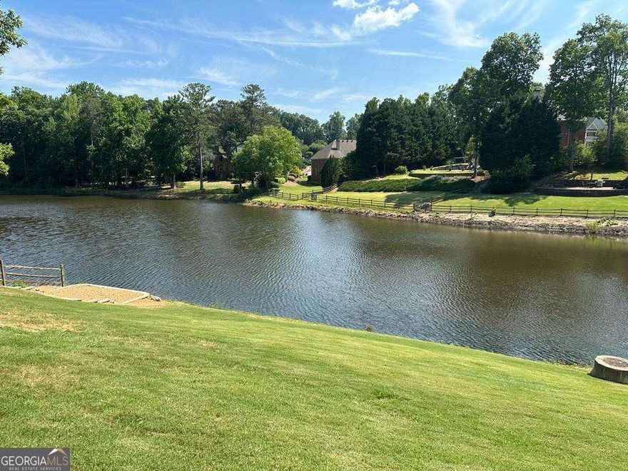 This rare LAKEFRONT LOT is nestled in the highly sought-after Glen Abbey swim/tennis community and features a stunning 4-sided brick home with a grand two-story foyer, open floor plan filled with natural light, and expansive lake views from the oversized deckCoperfect for entertaining. The home boasts a chefCOs kitchen, keeping room with granite countertops, double oven, and ample cabinetry, a spacious dining room for 12+, and multiple fireplaces adding warmth to the family room, living room, and luxurious master suite with a fully updated spa-like bathroom. With 6 bedrooms, including one on the main level and another in the finished basement (alongside a full bath, billiard room, and flex spaces), plus a 3-car garage, professionally landscaped cul-de-sac lot, and abundant storage throughout, this exceptional home offers space, style, and serene lakefront living.Glen Abbey is a premier Alpharetta community offering a prime location near GA 400, Avalon, Downtown Alpharetta, and top schools, with resort-style amenities including a renovated 5,000 sq. ft. clubhouse, Junior Olympic and zero-entry pools, fitness center, eleven tennis courts with pros, sport court, walking trails, a scenic lake with observation dock, and award-winning swim and tennis teams for the whole family.