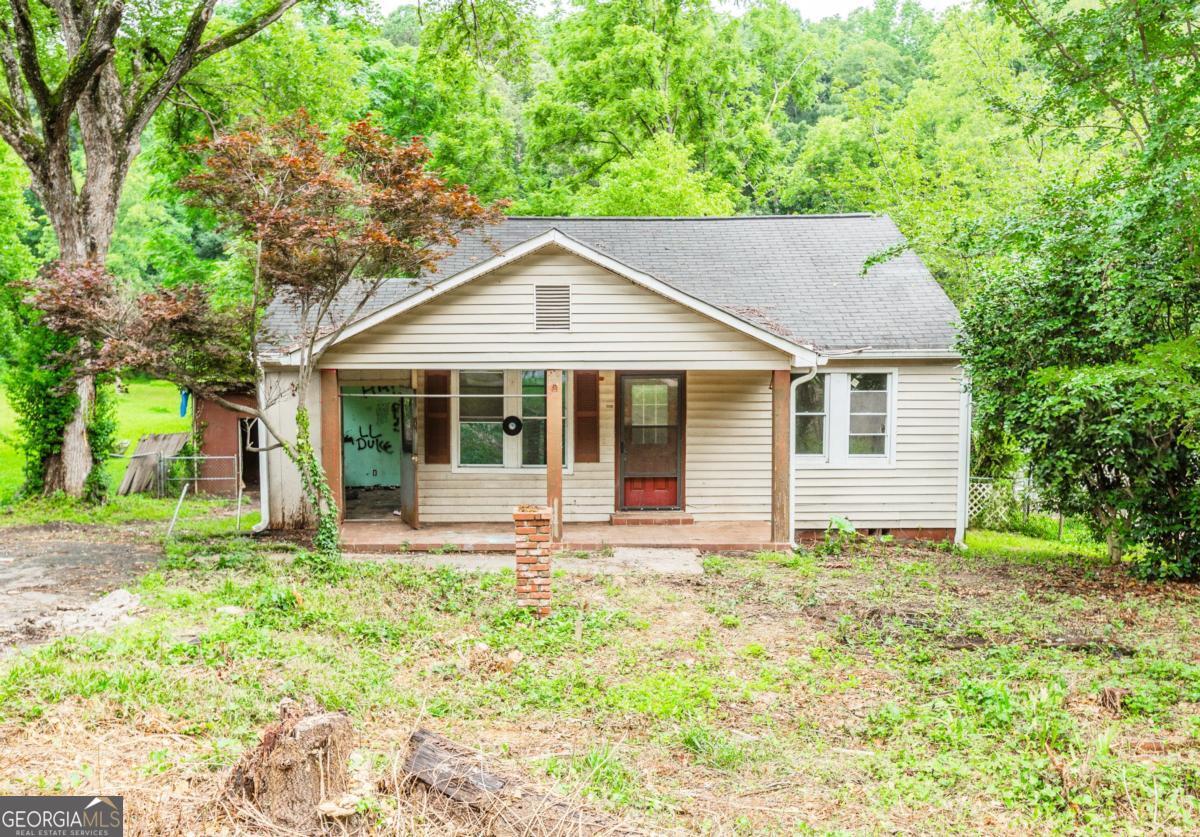 Investors, builders, and visionaries - don't miss this opportunity. This 3-bedroom, 1-bath ranch on a level lot in one of DeKalb's fastest-growing neighborhoods. Featuring a true ranch layout, crawl space foundation, and a private owner's suite, the home is the perfect canvas for a high-return transformation. Just 5 miles from the Atlanta BeltLine and steps from Gresham Park's gym, pool, and scenic trails, the location offers unbeatable access to top amenities. Surrounded by ongoing development and quality renovations, this property is well-positioned for significant after-repair value. Bring your vision - the potential here is undeniable.