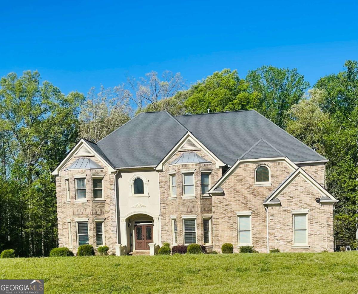 Bring your clients to view this 5 bedroom, 4 bathroom with 2 half bath home located in the Kingsbrook Subdivision. When entering you'll fall in love with the open, two story foyer that also overlooks the living room, located right off the open kitchen. This home is very spacious and ready for you and all of your family and friends to entertain. Every bedroom is very large and will fit all of your massive bedroom furniture. In the cozy, primary bedroom you'll find a calming fireplace, a large sitting area along with a wet bar for more private entertaining. As you head back downstairs, looking down at the foyer and the living area, make your way to the finished basement. The basement is mancave/womancave/kidcave ready, two finished rooms, a half bathroom, bar area for the up an coming NFL season, plenty of storage areas, another quiet sitting area and so much more!! This home is a one owner occupied home and is not a fixer upper and has very little and minor cosmetics fixes, as most homes do. Please don't let your clients miss out on viewing this amazing property in Ellenwood!